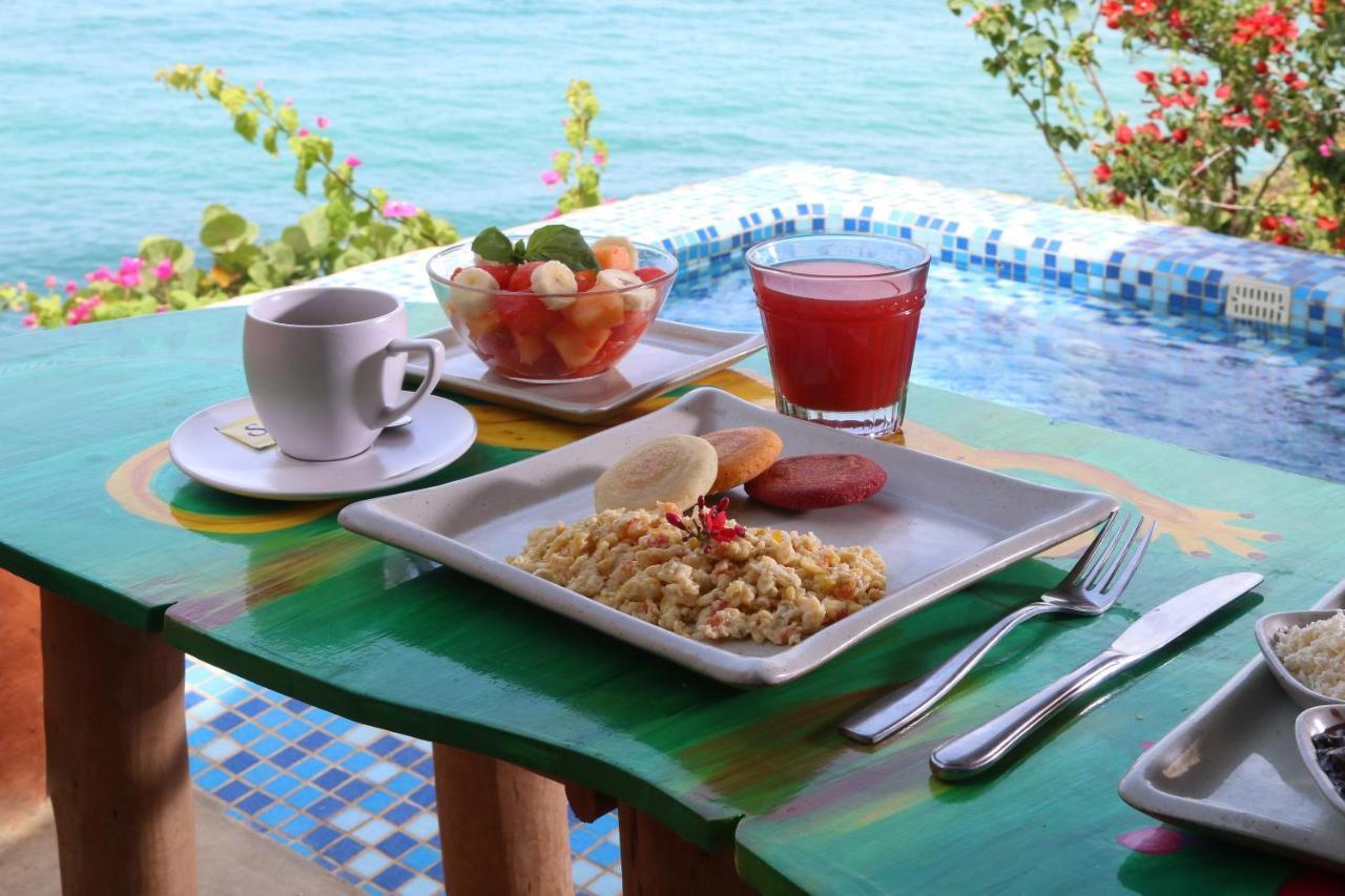 Cala Margarita Hotel Paraguachi Bagian luar foto